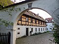 Residential stable house (No. 4d) and moving house (No. 4a / 4b) as well as the entrance to a former three-sided courtyard