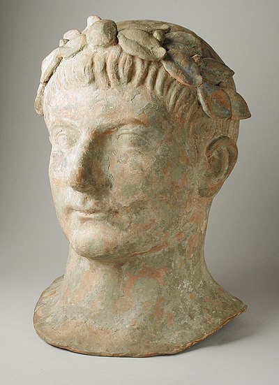 Terracotta head of a Man Wearing a Laurel-Wreath, 2nd century BC