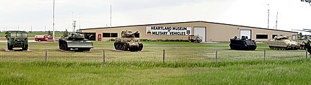 View from the south-west showing five of the vehicles outside Heartland Museum of Military Vehicles.jpg