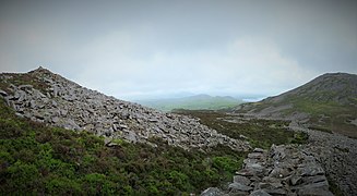 Inside the Celtic Iron Age hillfort of Tre'r Ceiri, Gwynedd Wales, with 150 houses; finest in N Europe 31.jpg