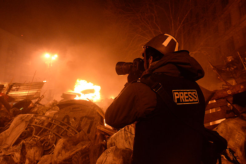 File:Journalist documenting events at the Independence square. Clashes in Ukraine, Kyiv. Events of February 18, 2014..jpg