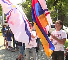 Kids holding the Assyrian and Armenian flags in Yerevan.jpg