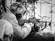 A Finnish soldier equipped with a Lahti-Saloranta M/26 during the Winter War. Lahti-Saloranta M-26 in position.jpg