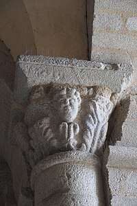 Romaneaque column capital on the porch of the bell tower