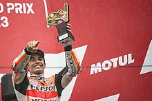 Marc Marquez with his third place trophy. Marc Marquez 2023 motegi podium.jpg