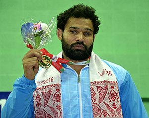 Mausam Khatri (India) winner of Gold Medal in 97kg Men’s wrestling, during the presentation ceremony, at the 12th South Asian Games-2016, in Guwahati on February 08, 2016.jpg