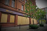 Boarded up Monsoon fashion shop in Grafton Street