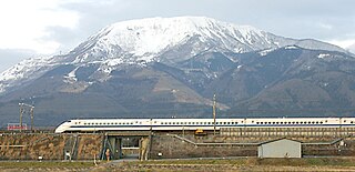 Mt. Ibuki and bullet train in Maibara, Shiga.jpg