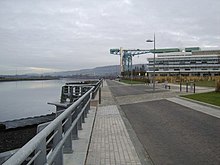 New Clydebank Waterfront at the former John Brown & Company shipyard, including the new Clydebank College campus and the restored Titan Crane.