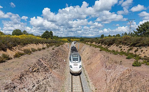 Passenger train to Madrid has just passed the station of Linarejos-Pedroso, Spain