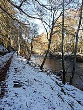 Path alongside the River Tilt, Perthshire, in the snow