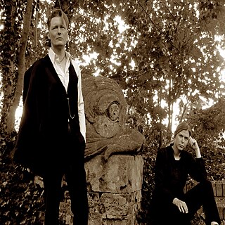 Saline Grace is a Germany-based alternative band that emerged from the German avantgarde band Nobility Of Salt and was founded by Ricardo Hoffmann and Ines Hoffmann in 2005.