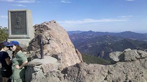 Summit of Sandstone Peak with plaque and summit book