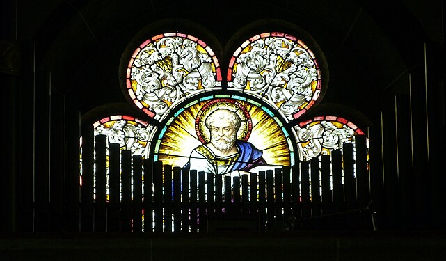 Stained glass window behind pipe organ, Schluderns, South Tyrol
