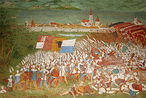 Fresque médiévale d’une bataille.