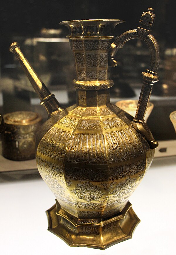 Ayyubid inlaid metal ewer, in the name of Ayyubid Sultan An-Nasir Yusuf. 1258-1259, Damascus, Syria. Louvre Museum.