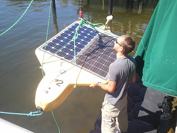 A University of South Florida researcher deploys Tavros02, a solar-powered "tweeting" AUV (SAUV).