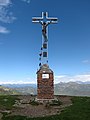 * Nomination Summit cross on mountain Monte Bregagno, in Lombardy, Italy. --Mænsard vokser 11:32, 31 May 2020 (UTC) * Promotion Is the tilt for real or was the camera tilted? --Poco a poco 12:29, 31 May 2020 (UTC) The ground was not completely flat and cross was bit tilted too. I already rotated a little bit the picture, before the upload, to what I think is closest to reality.--Mænsard vokser 08:10, 1 June 2020 (UTC)  Support Ok, QI then --Poco a poco 09:55, 1 June 2020 (UTC)