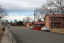 A view of a street in Denver's Sun Valley neighborhood. On the right is some of the area's public housing. SunValleyDenver.JPG