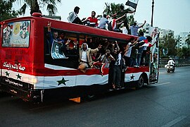 Syrian people celebrate Bashar Assad's presidential re-election in Damascus-2014 (1).jpg