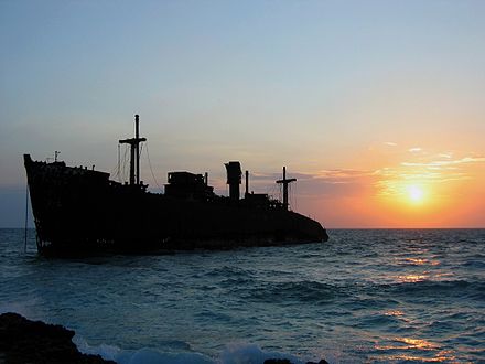 A view of a Greek ship at sunset