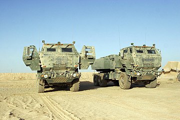 Two Lockheed Martin/BAE Systems M1140 High Mobility Artillery Rocket System (HIMARS) of the U.S. Marines