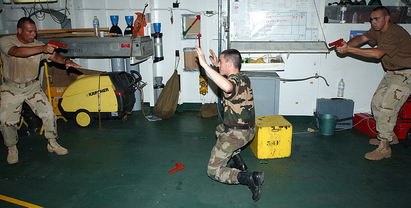 File:US Navy 040530-C-1034C-045 Members assigned to the U.S. Coast Guard Law Enforcement Detachment Four Zero Three (USCG LEDET- 403), based out of Miami, Fla., teach members of the French, Spanish and Italian Navies basic Law Enfor.jpg