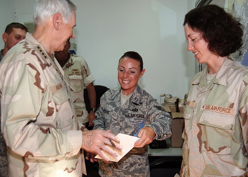 File:US Navy 071211-N-3285B-008 Staff Sgt. Ann Bleier and another member of Combat Camera on board Camp Lemonier ask Adm. William J. Fallon, commander, U.S. Central Command, to sign a Christmas card.jpg