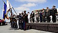 US Navy http-www.navy.mil-management-photodb-photos-100603-N-8607R-037 California Governor Arnold Schwarzenegger and official party render honors during the national anthem.jpg