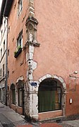 Street corner with statue of Madonna, rue du 4 septembre / rue des Clercs in Vienne, France.