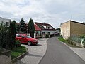 Čeština: Auto a domy ve Vrbičanech. Okres Litoměřice, Česká republika. English: Car and houses in Vrbičany village, Litoměřice District, Czech Republic.
