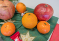 * Nomination Christmas fruits on a table for consumption. --PantheraLeo1359531 14:30, 24 December 2023 (UTC) * Decline  Oppose Composition appears to be random and DoF is not appropriate for this motif. --MB-one 22:14, 25 December 2023 (UTC)