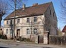 Homestead, consisting of a house, two stable buildings and a barn