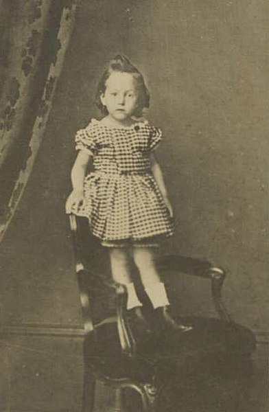 An unbreeched Hughes at about the age of four