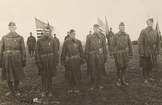 Officers just decorated with the DSC by Major General Hanson Ely, commanding the 5th Division, at Esch, Luxembourg, December 30, 1918. On the extreme 