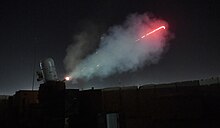 The tracers of the ammunition 180113-F-SR682-0157 - C-RAM Night Fire (Image 3 of 4).jpg