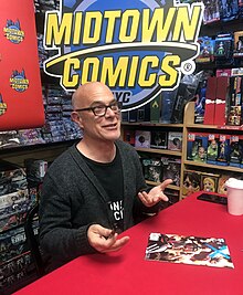 Writer Jim Krueger signing a copy of the book at Midtown Comics Grand Central in Manhattan 2.27.20JimKruegerEarthXByLuigiNovi2.jpg