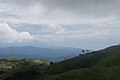 20160410093727 - Stormy hills near Nunkolo, West Timor. Timor Sea on right (26276267321).jpg