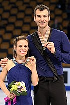 2016 Worlds - Duhamel & Radford victory ceremony - 01.jpg