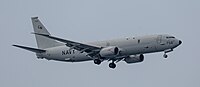 A US Navy P-8 Poseidon, tail number 168756, on final approach at Kadena Air Base in Okinawa, Japan.