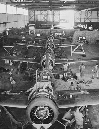 Brewster Buffaloes of 67 Squadron being re-assembled at Singapore following shipment from the USA. February 1941 67 Squadron Buffaloes.jpg