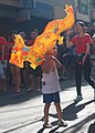 A_boy_with_dragon_balloon