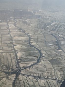 Luchtfoto van Spijkerboor, met het Noordhollandsch Kanaal in het verschiet