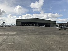An outside view of a hangar in a military RAF base An outside view of a hangar.jpg