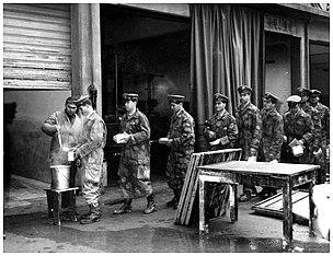 Mud angels in November 1966. Angeli del fango della Scuola Sottufficiali Carabinieri, fotografati a novembre del 1966.jpg