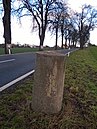 Post mile column (round base stone), at km 51.6