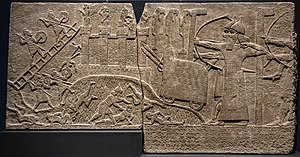 Relief from Tiglath-Pileser's palace in Nimrud depicting the Assyrians besieging a town Assyrian Relief Attack on Enemy Town from Kalhu (Nimrud) Central Palace reign of Tiglath-pileser III British Museum - 2.jpg