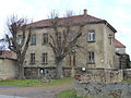 Former brewery with a porch