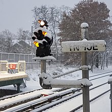 B&O CPL signal displaying yellow on the Staten Island Railway, 2018 B&0 CPL signal, yellow.jpg