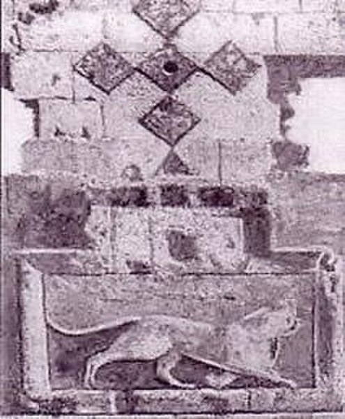 Bas-relief of a leopard with a cross above it from the gates of Ani, believed to be the symbol of the city or of the Bagratuni dynasty.